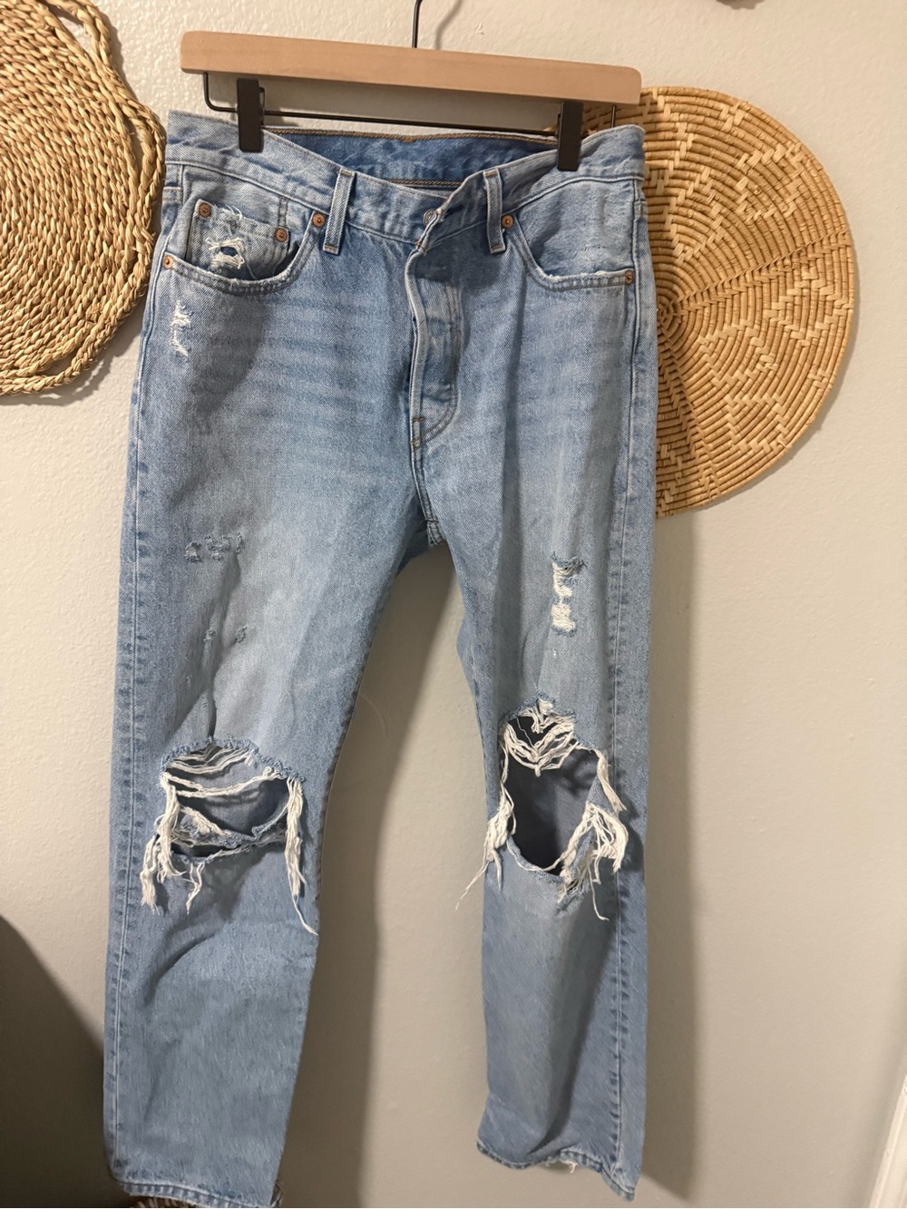 Levi’s women’s Light Blue Distressed Jeans